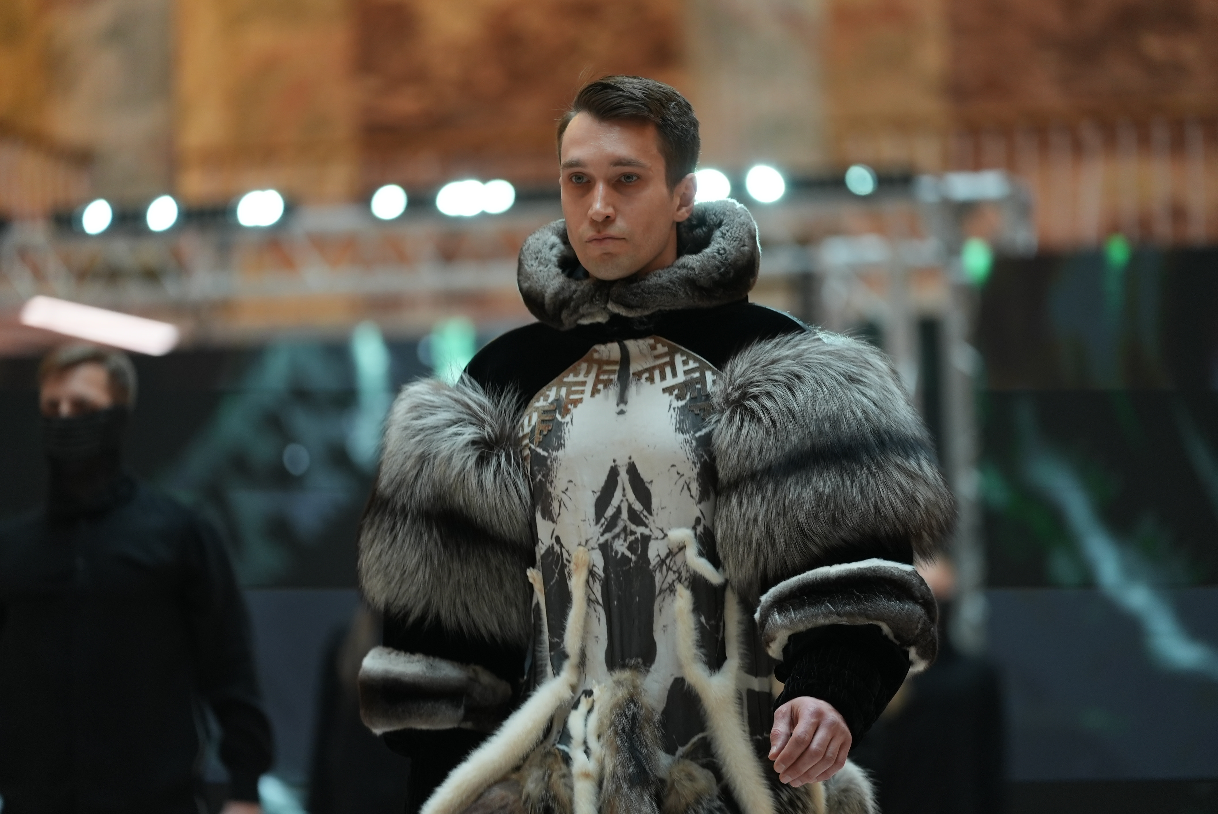 Dmitriy Kovin on the runway in a couture fur look